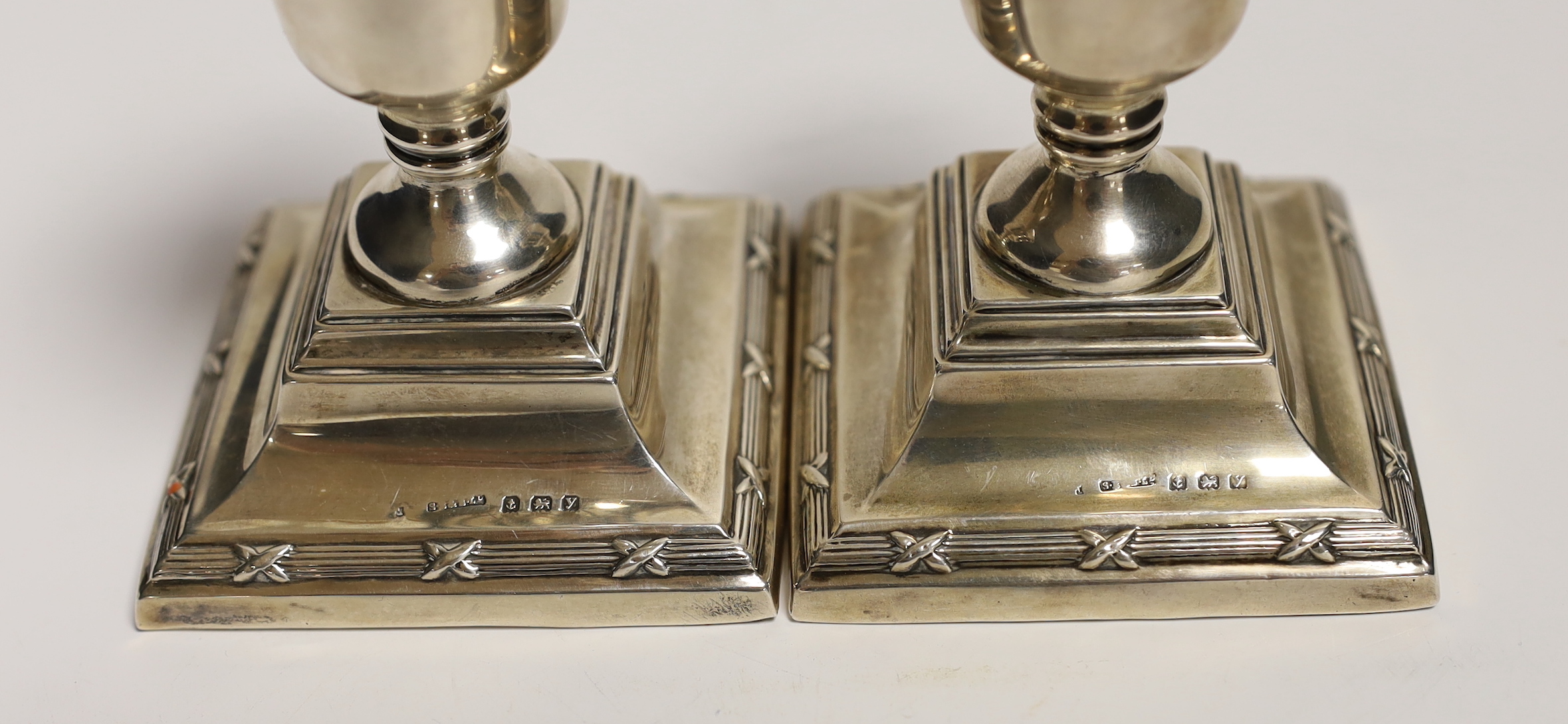 A pair of George V silver mounted dwarf candlesticks, S. Blanckensee & Sons Ltd, Birmingham, 1923, 85mm, weighted.